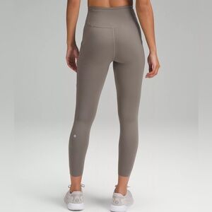 Lululemon Fast and Free High-Rise Tight 25” Pockets in Carbon Dust